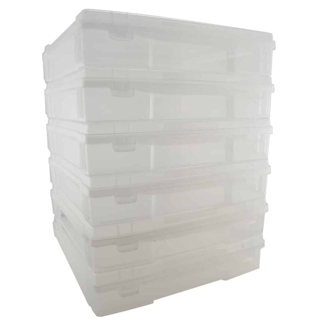 Stackable storage containers for scrapbooking, perfect for organization and easy access.