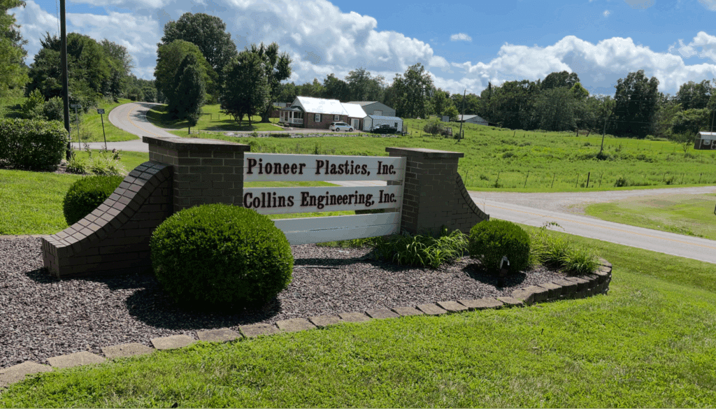 Pioneer Plastics sign showcasing a quality plastic injection molding partner