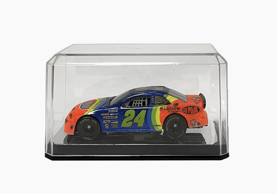 Colorful diecast racecar model 24 displayed in a protective case.