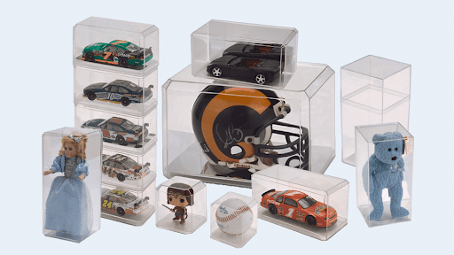 Collectible display boxes showcasing toys, sports memorabilia, and figurines for organized storage.