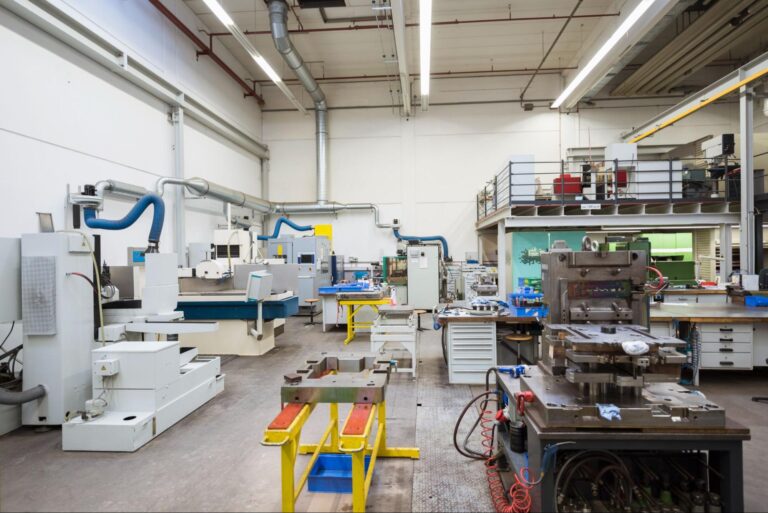 Modern manufacturing facility showcasing advanced machinery and organized workspace.