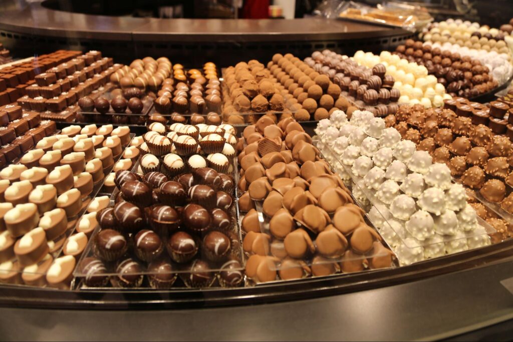 Indulge in a stunning display of assorted gourmet chocolates.