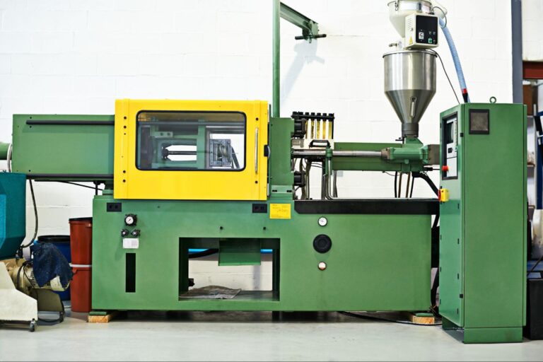 Industrial injection molding machine for efficient plastic production and manufacturing processes.