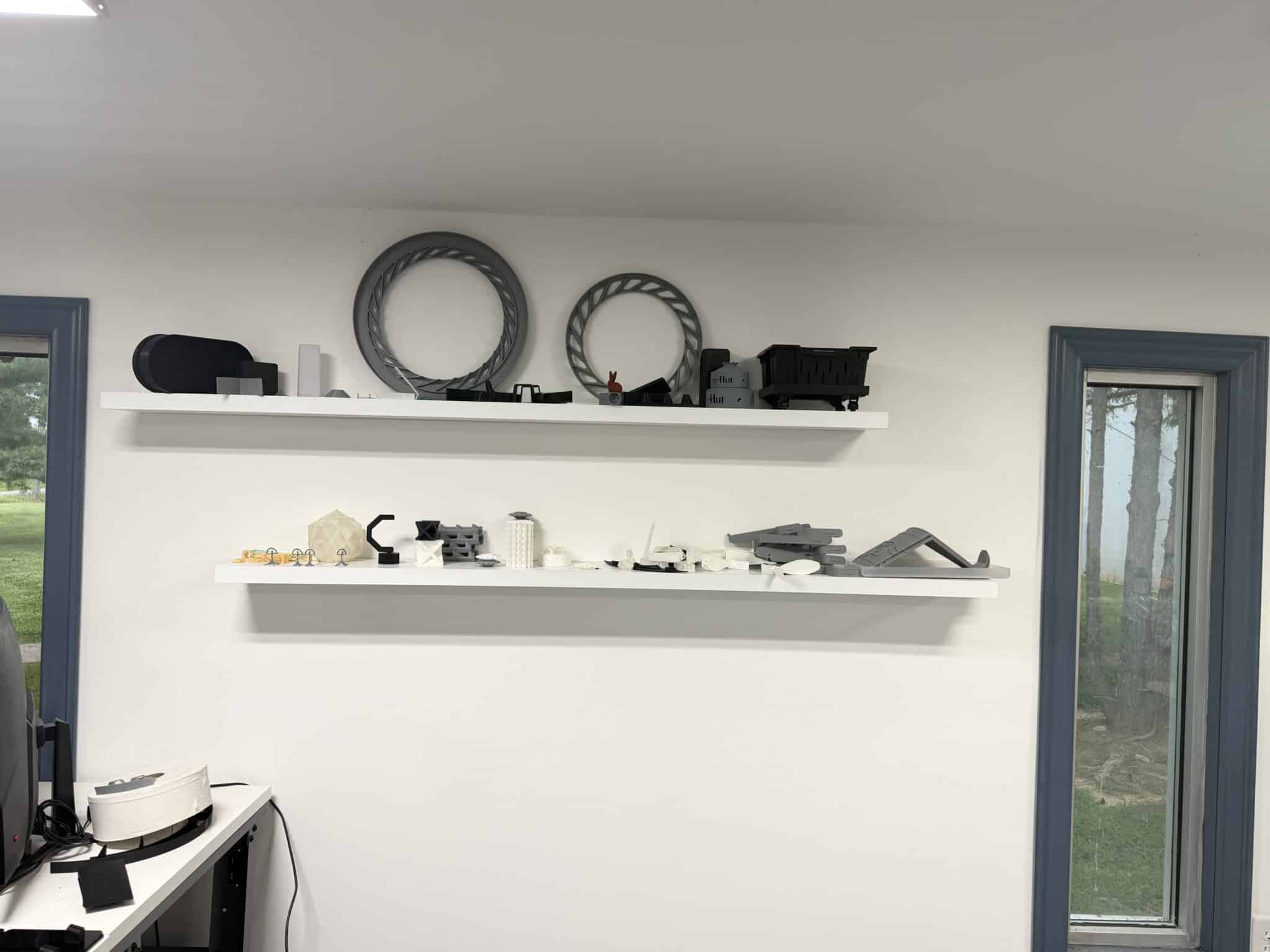 Shelves of 3D printed sample parts and prototypes at Pioneer Plastics